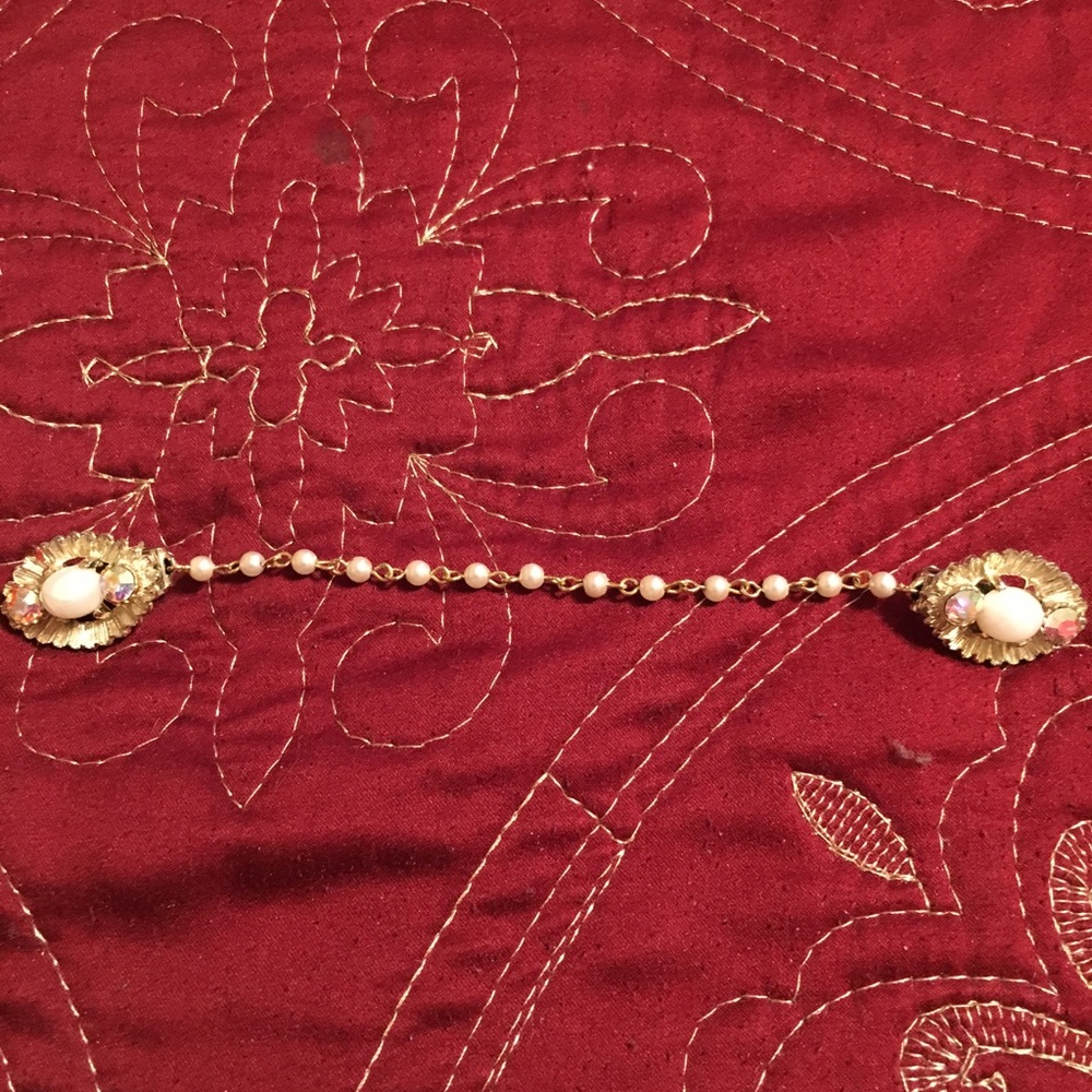 Antique sweater clips